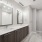Photo of Aventon Soraya's master bathroom with double vanity, linen closet and walk-in shower